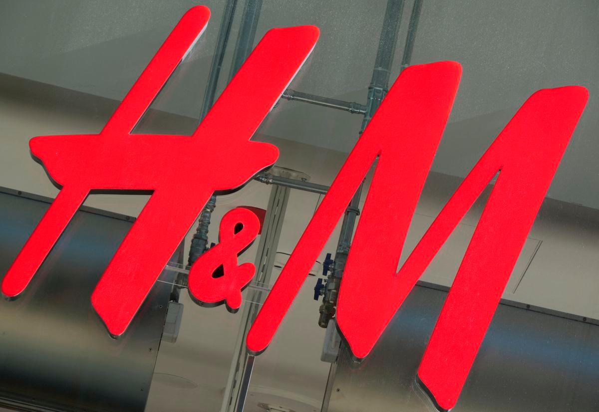 The logo for H&amp;M is displayed outside a store in Stockholm, Sweden, September 23, 2025. REUTERS/Tom Little