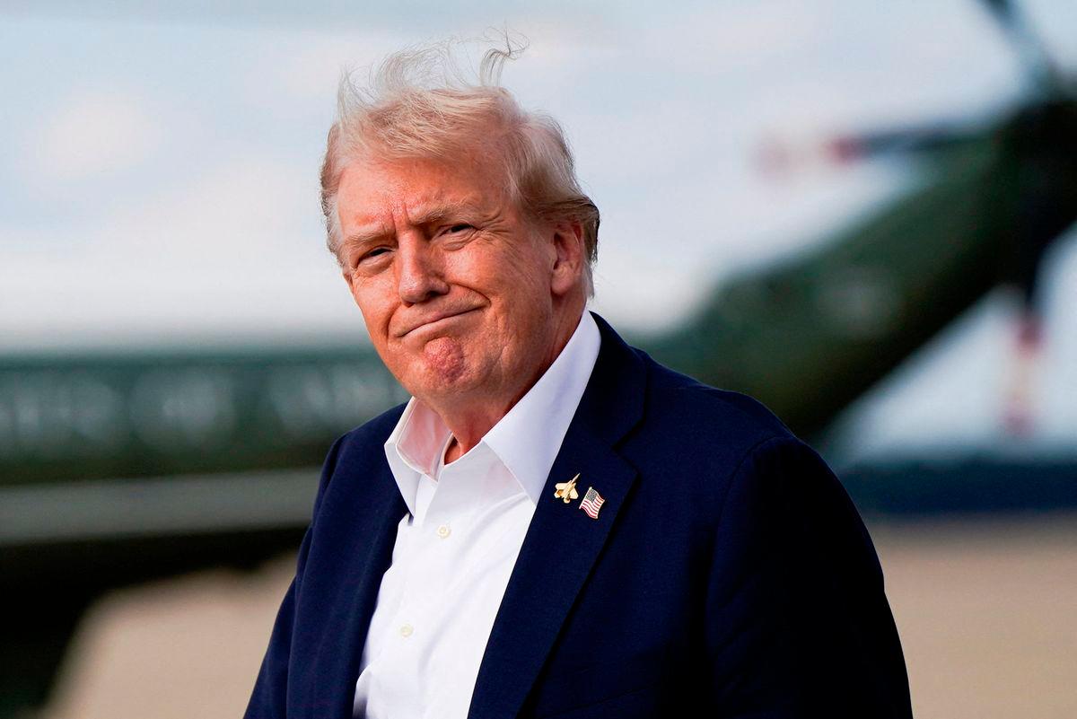U.S. President Donald Trump reacts, as he arrives at Joint Base Andrews, Maryland, U.S., September 26, 2025. REUTERS/Elizabeth Frantz