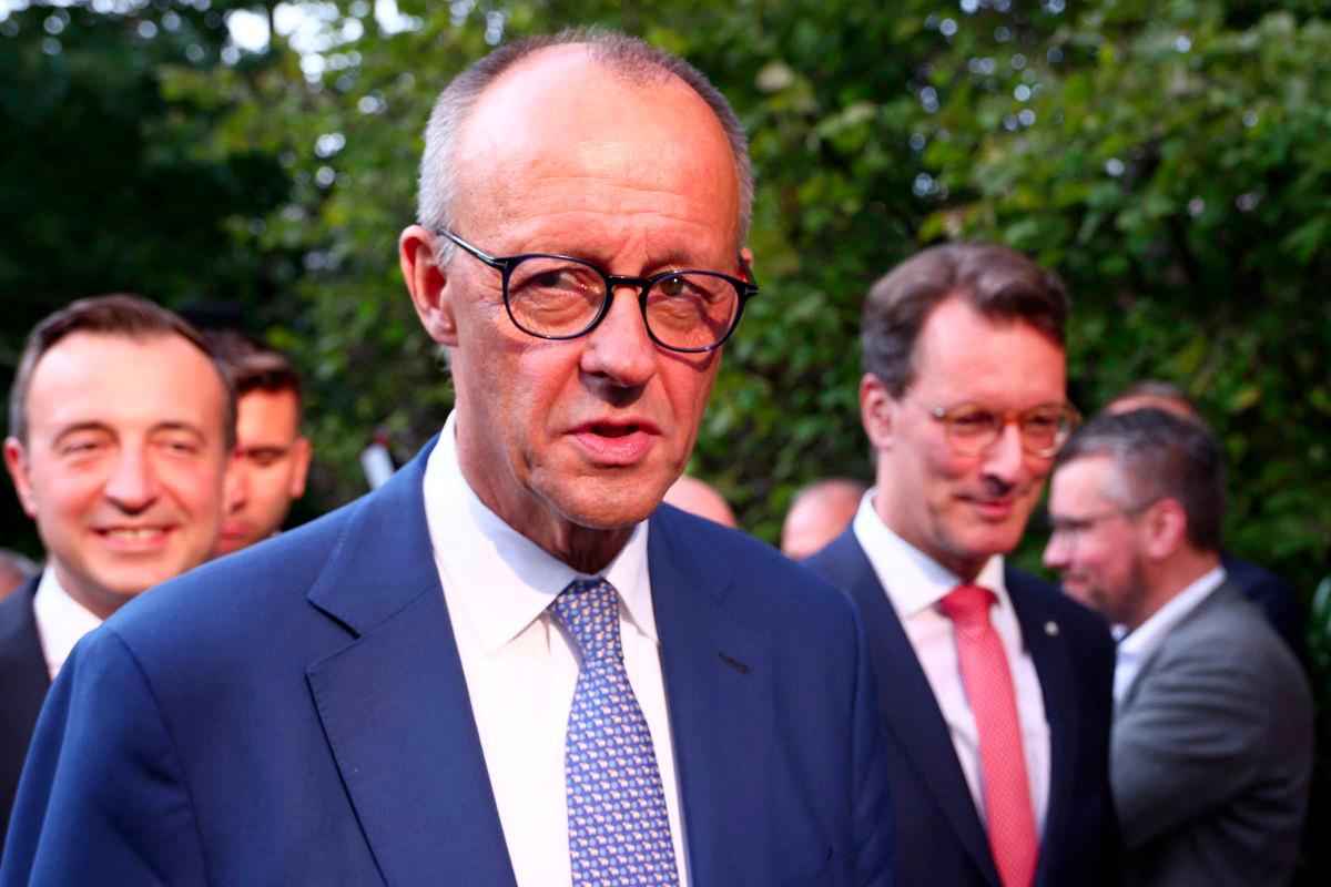 German Chancellor and the leader of Germany's Christian Democratic Union (CDU), Friedrich Merz and North Rhine-Westphalia State Premier Hendrik Wuest arrive to address the media following local elections in North Rhine-Westphalia (NRW), in Duesseldorf, Germany, September 29, 2025. - REUTERSPIX