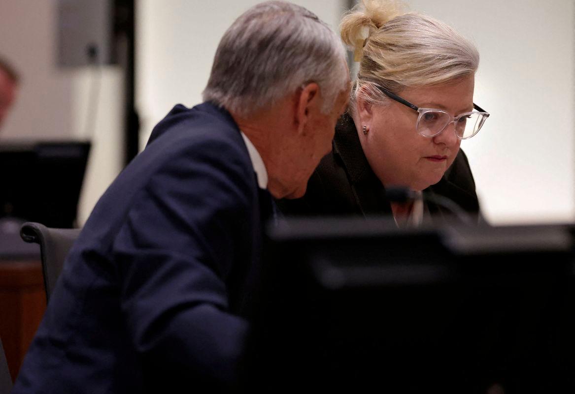 Defense attorneys Michael N. Burt and Kathryn Nester confer during a waiver hearing for Tyler Robinson, the man accused of killing Charlie Kirk at Utah Valley University, in Utah County Court in Provo, Utah, U.S., September 29, 2025. - Laura Seitz/Pool via REUTERSPIX