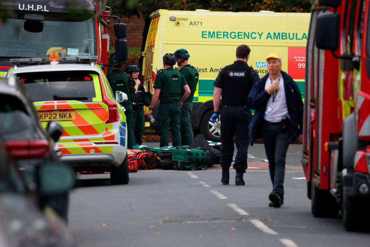 Emergency personnel work at the scene following an incident outside a synagogue in north Manchester, Britain, October 2, 2025. REUTERS/Phil Noble