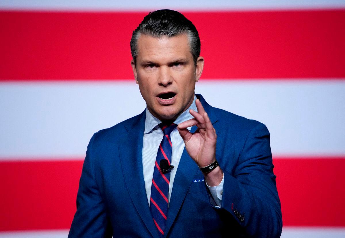 FILE PHOTO: U.S. Secretary of Defense Pete Hegseth speaks to senior military leaders at Marine Corps Base Quantico, in Quantico, Virginia, U.S., September 30, 2025. In an unprecedented gathering, almost 800 generals, admirals and their senior enlisted leaders have been ordered into one location from around the world on short notice. Andrew Harnik/Pool via REUTERS/File Photo