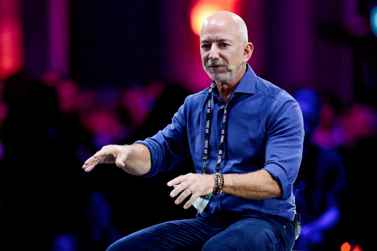 Amazon founder Jeff Bezos gestures as he speaks at the main panel of Italian Tech Week 2025 in Turin, Italy October 3, 2025. - REUTERSPIX