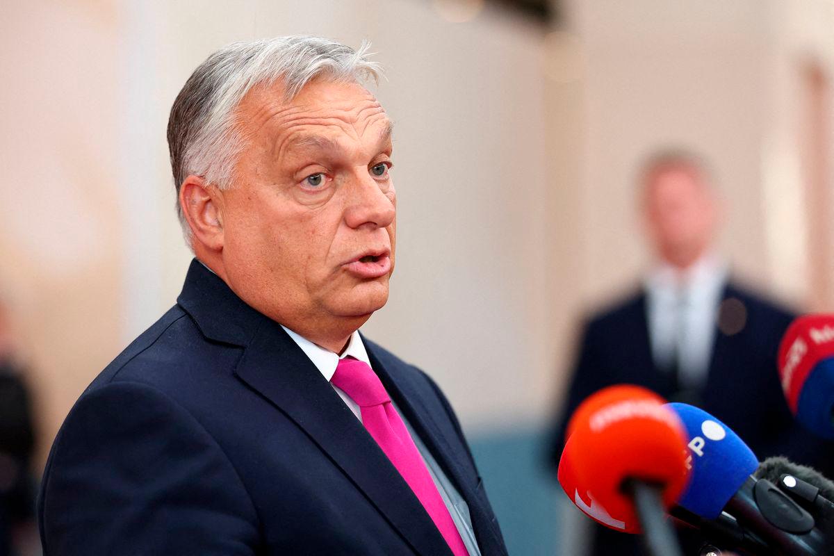 FILE PHOTO: Hungarian Prime Minister Victor Orban speaks to members of the media at the European Political Community summit in Copenhagen, Denmark, October 2, 2025. REUTERS/Piroschka van de Wouw/File Photo