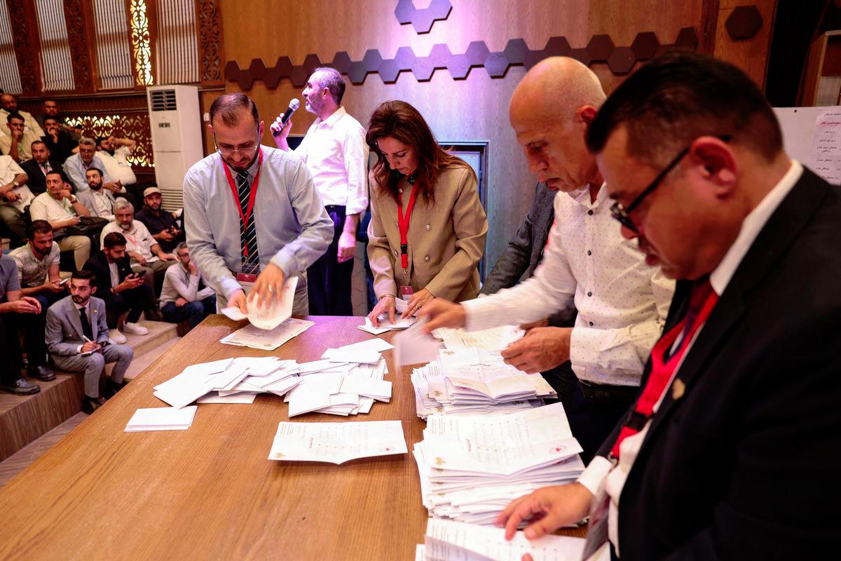 Members of electoral colleges count votes, on the day they vote for candidates of the new Syrian Parliament since Bashar al-Assad’s government was toppled, in Aleppo, Syria, October 5, 2025. - REUTERSpix