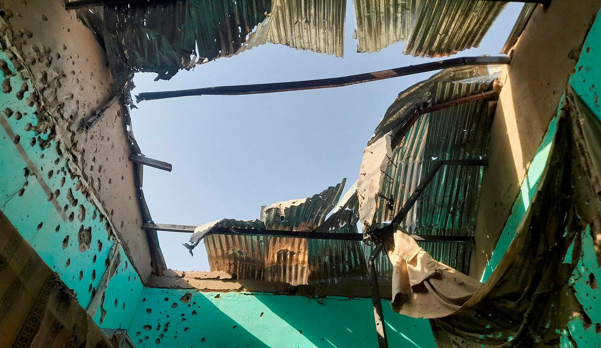 A ceiling damaged by shelling shrapnel at a displaced persons center in El Fasher, Sudan, October 7, 2025. - REUTERS/Mohyaldeen M Abdallah