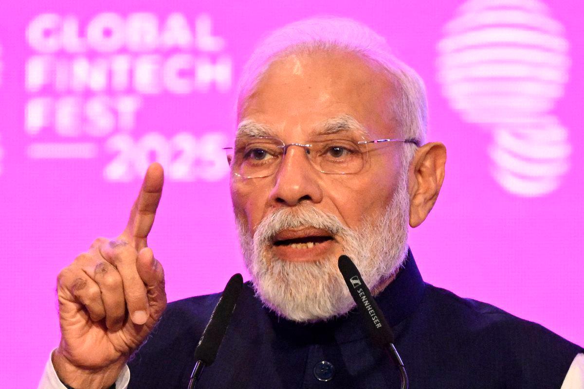 Indian Prime Minister Narendra Modi speaks at the Global Fintech Fest, during a visit by British Prime Minister Keir Starmer (not pictured), on October 9, 2025, in Mumbai, India. Leon Neal/Pool via REUTERS