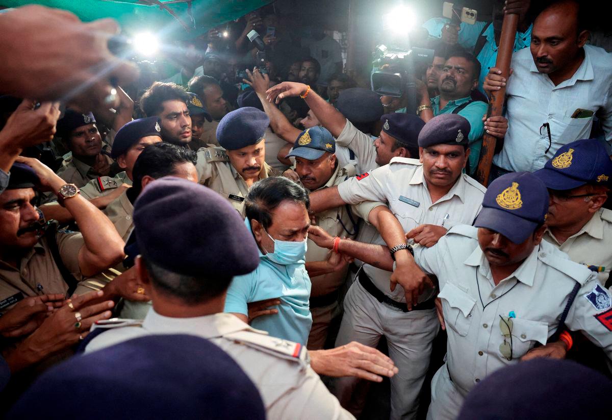 Sresan Pharma owner, S. Ranganathan, is escorted by Police to a local court after one of their medicines, Coldrif cough syrup, was linked to the death of multiple children in Parasia, Madhya Pradesh, India, October, 10, 2025. - REUTERS