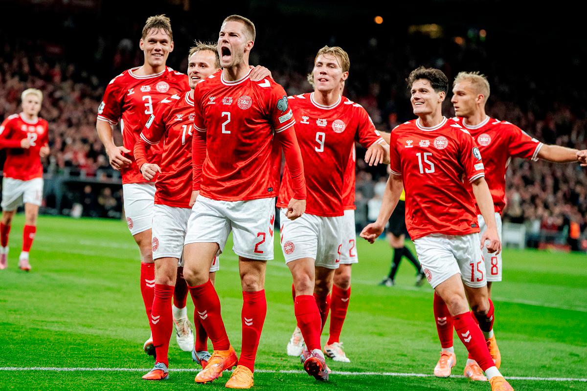 Denmark’s Joachim Andersen celebrates scoring their second goal with teammates Mads Claus. - Rasmussen/Ritzau Scanpix via REUTERS