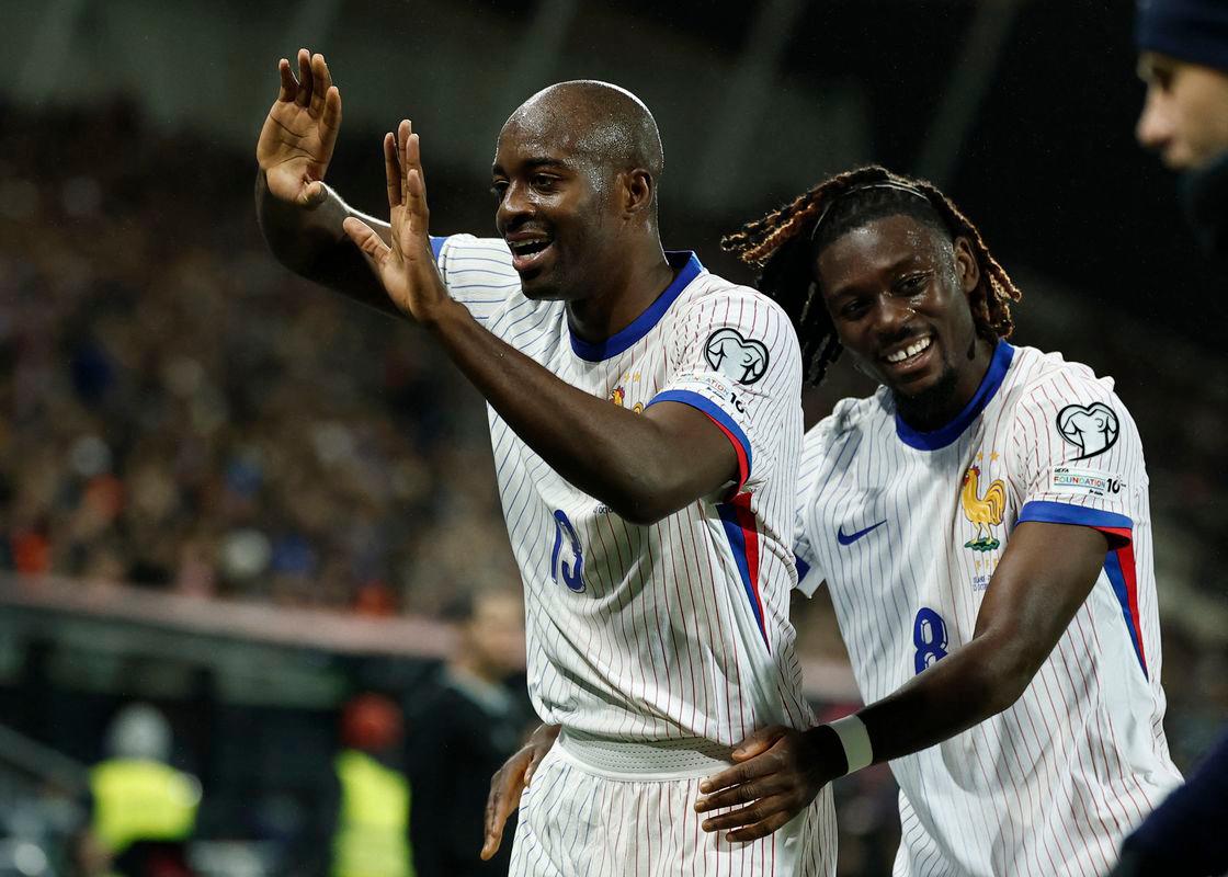 France’s Jean-Philippe Mateta celebrates scoring their second goal with Manu Kone. REUTERS