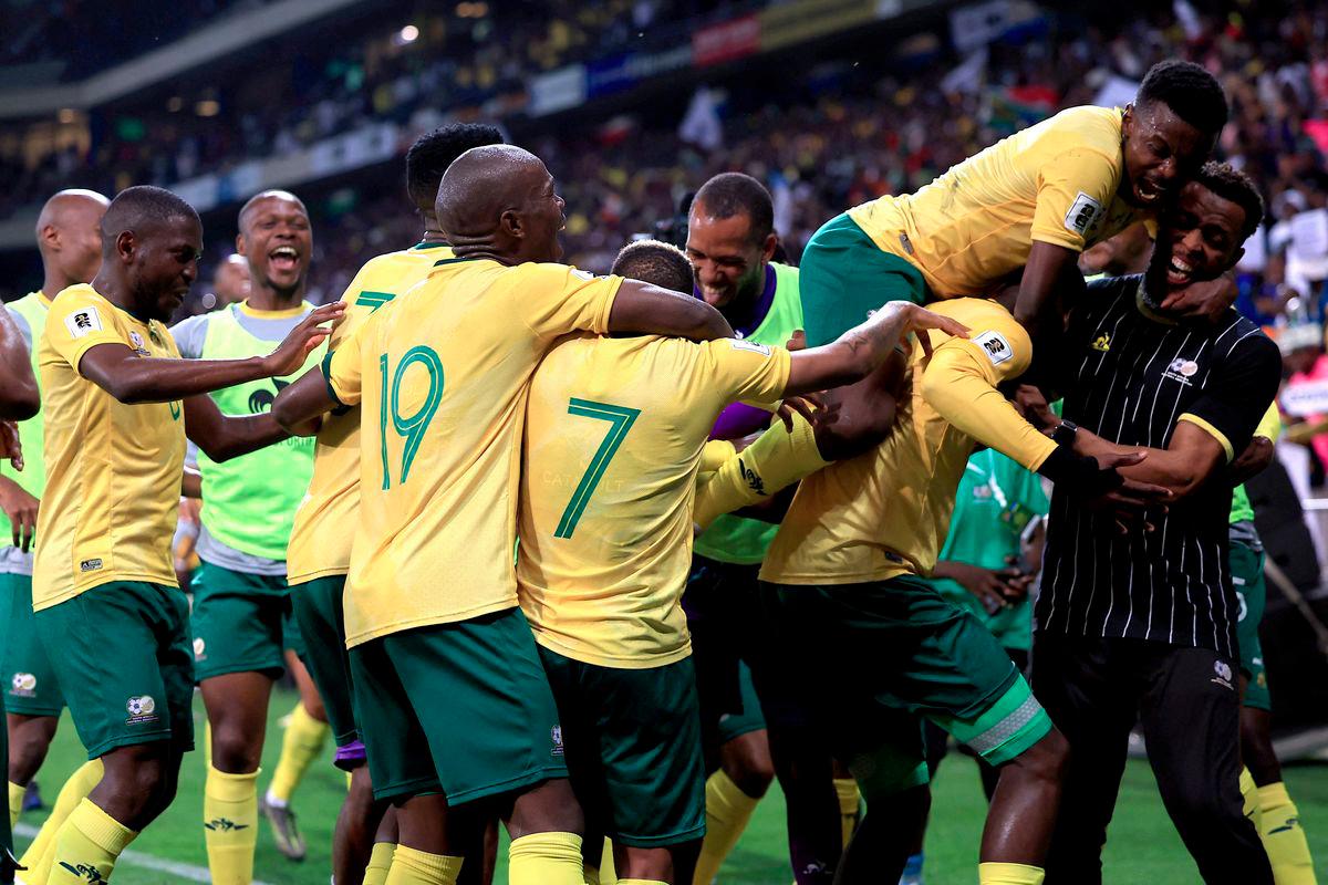 Football - FIFA World Cup - CAF Qualifiers - Group C - South Africa v Rwanda - Mbombela Stadium, Mbombela, South Africa - October 14, 2025South Africa's Evidence Makgopa celebrates scoring their third goal with teammates - REUTERSPIX