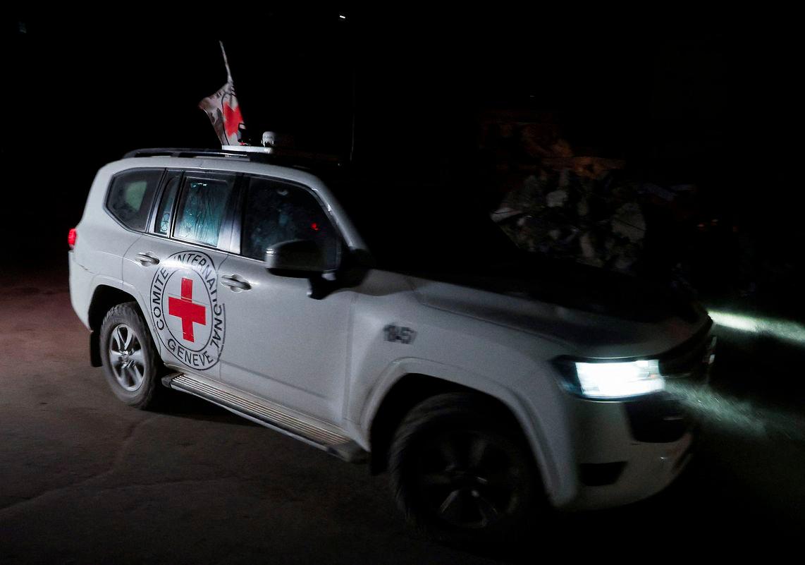 A Red Cross vehicle transports the bodies of hostages who were held in Gaza since the deadly October 7, 2023, attack, after they were handed over by Hamas militants as part of a ceasefire and a hostage-prisoner swap deal between Hamas and Israel, in Gaza City, October 15, 2025. - REUTERSPIX