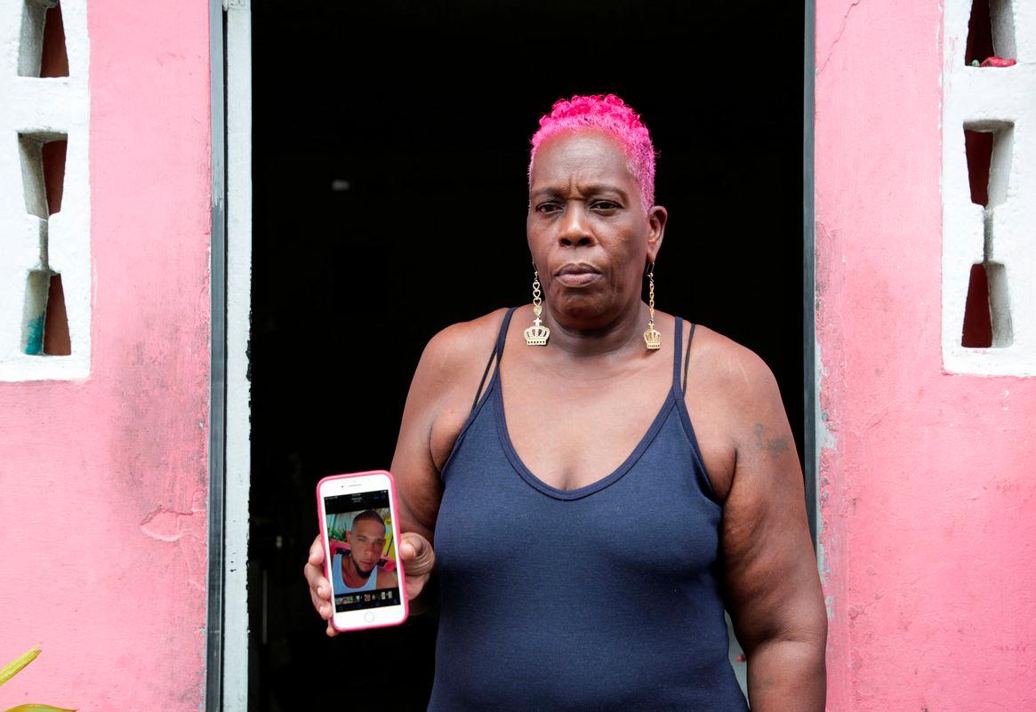 Lynette Burnley who believes her nephew Chad Joseph was killed in a U.S. military strike on a boat in the Caribbean, shows a photo of Joseph as his family demands evidence to support President Donald Trump’s claim that the victims were drug traffickers, in Las Cuevas, Trinidad and Tobago October 16, 2025. - REUTERSPIX