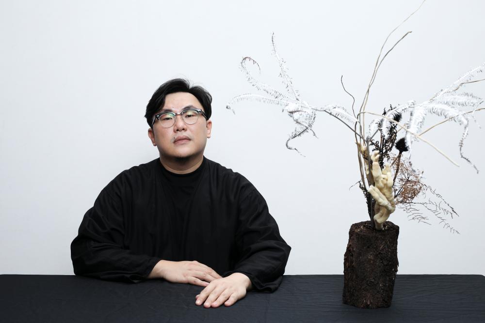Former graphic designer Tan became a florist as he craved for a more tactile approach to art. – COURTESY OF JOSHUA TAN