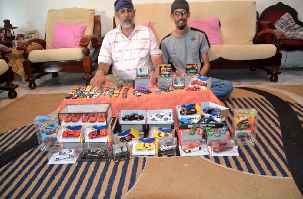 $!Father and son with their car collection. – COURTESY OF KAVALDIP SINGH