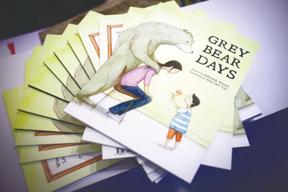 $!Sabrinah wrote teh book ‘Grey Bear Days’ to help parents talk to their children about depression. – Courtesy of Aisyah Ambok