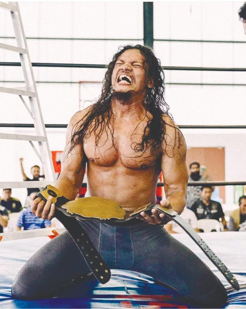 Azwan when he won the MyPW Regional to World Championship Belt under the name Serigala. – Courtesy of Azwan Razali $!Azwan when he won the MyPW Regional to World Championship Belt under the name Serigala. – Courtesy of Azwan Razali