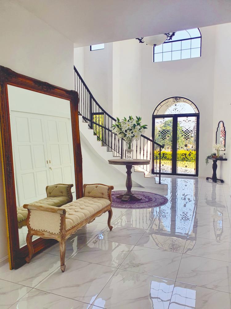 The iron wrought door and staircase. $!The iron wrought door and staircase.