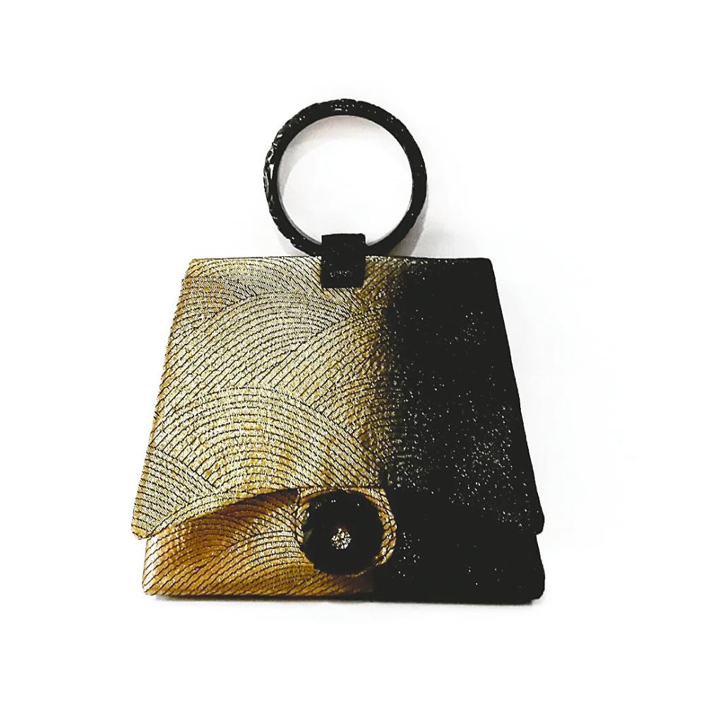 One of Ong’s more elaborate Obi silk bags has a carved double dragon black jadeite handle, with a black jade centrepiece. – SOPHIA by Shirley