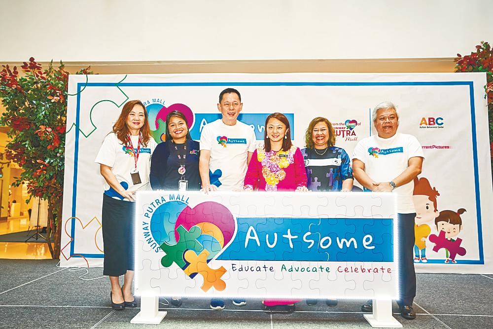 Yeoh and representatives from Sunway Malls at the Autsome launch.