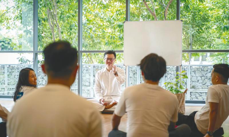 $!Michael leading a discussion at his The Essence of Life Workshop. – Michael Teh