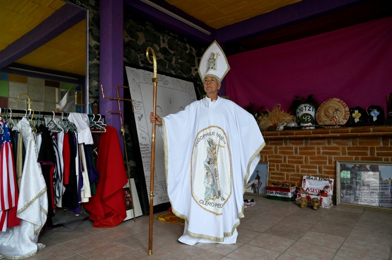 Mexican activist Julia Klug poses on August 8, 2019 in Mexico City wearing a pope-like outfit she wore to protest against the Catholic church. — AFP