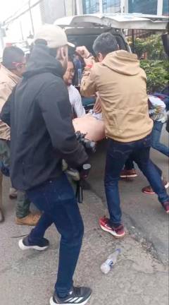 People carry Colombian Senator Miguel Uribe Turbay to an ambulance after, what the government and his party say, he was shot in Bogota, Colombia June 7, 2025, in this screengrab from a video. Video Obtained by REUTERS
