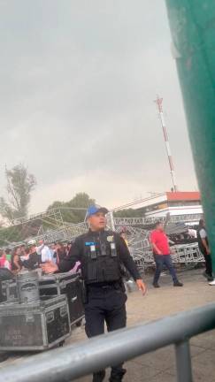 A member of the police looks on, at the site where a stage collapsed at a concert venue in Mexico City, Mexico, May 8, 2025, in this screen grab obtained from a social media video. REUTERSpix