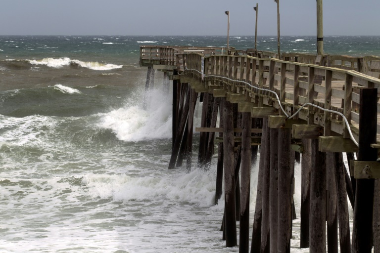 Waves crash as Hurricane Dorian make its way to Cape Hatteras in North Carolina, which the state’s governor warned is facing a “long night” from the storm. — AFP