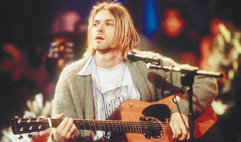 Kurt Cobain performing live on MTV unplugged with Nirvana with the iconic Martin guitar. – YOUTUBE