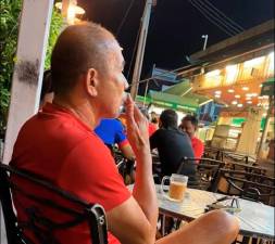 Uncle blows smoke at diner who asked him not to light up