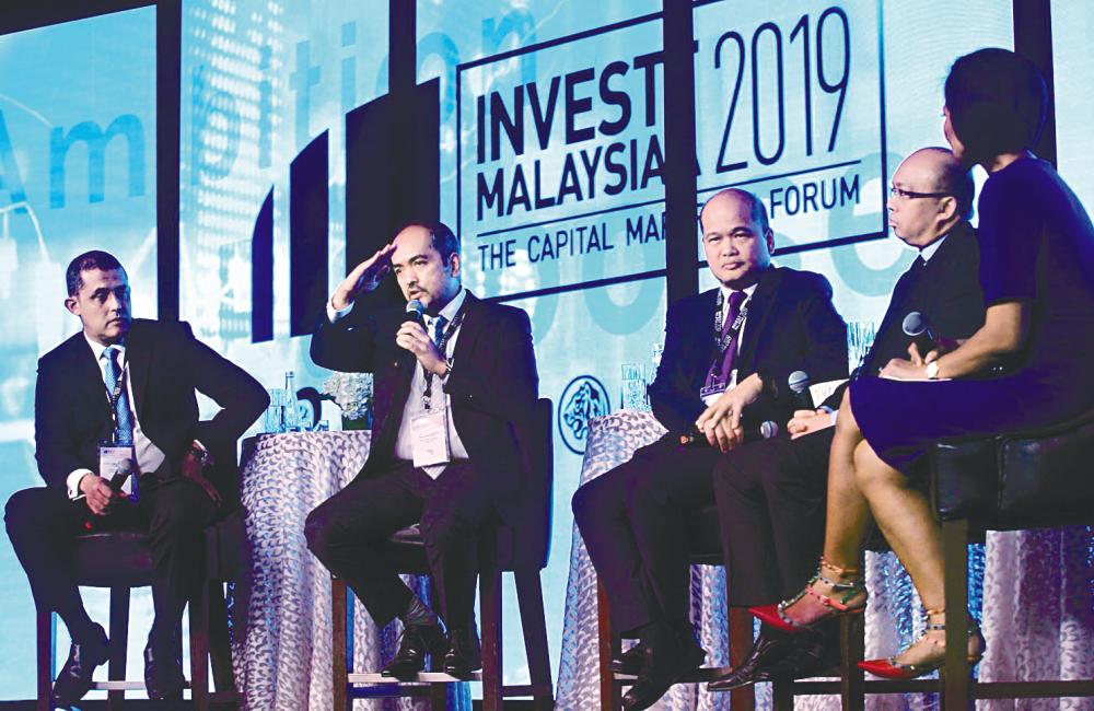 From left: Syed Hamadah, Tunku Alizakri, Shahril and PNB president &amp; CEO Datuk Abdul Rahman Ahmad and moderator Haslinda Amin at Invest Malaysia 2019 yesterday. – Zulkifli Ersal/theSUN