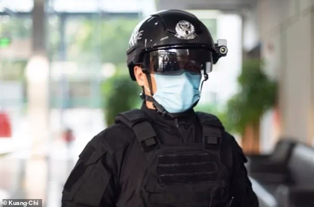 In Shenzhen, which shares a border with Hong Kong, police have also begun to inspect drivers who come into the city with the help of the helmets. The innovative equipment — named Smart Helmet N901 — is developed by Shenzhen-based tech firm Kuang-Chi for curbing the epidemic. — Pix from Daily Mail