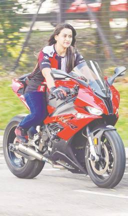 Nithiya rides her BMW S1000RR motorcyle to destress, build resilience and connect with like-minded communities. – AMIRUL SYAFIQ/THESUN