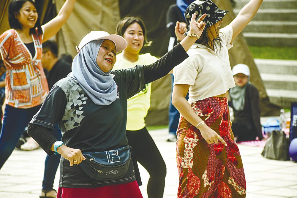 Participants enjoying a pumped up Zumba session. $!Participants enjoying a pumped up Zumba session.