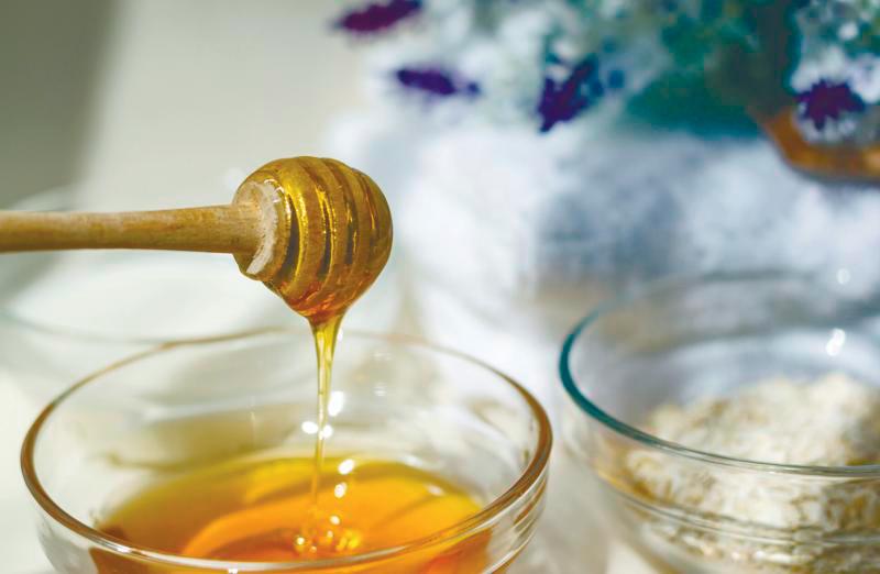 Honey right from the spoon is another low-cost cough home remedy with proven benefits. $!Honey right from the spoon is another low-cost cough home remedy with proven benefits.