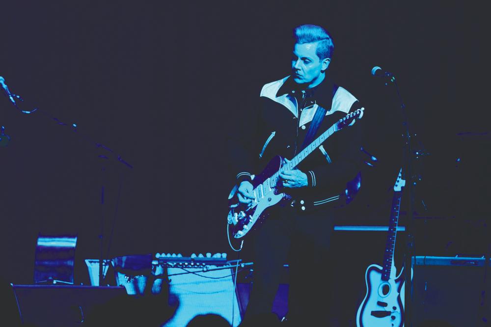 $!White and his sparkly blue Telecaster.