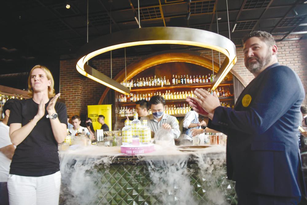 Albane Corbi and David Hogan unveiling the Four Pillars Fresh Yuzu Gin. – SYAZWAN KAMAL/THESUN