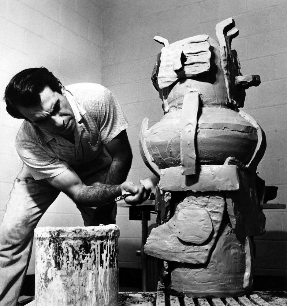 Peter Voulkos working on an untitled piece in Glendale studio, 1956. – VOULKOS &amp; CO. CATALOGUE PROJECT.