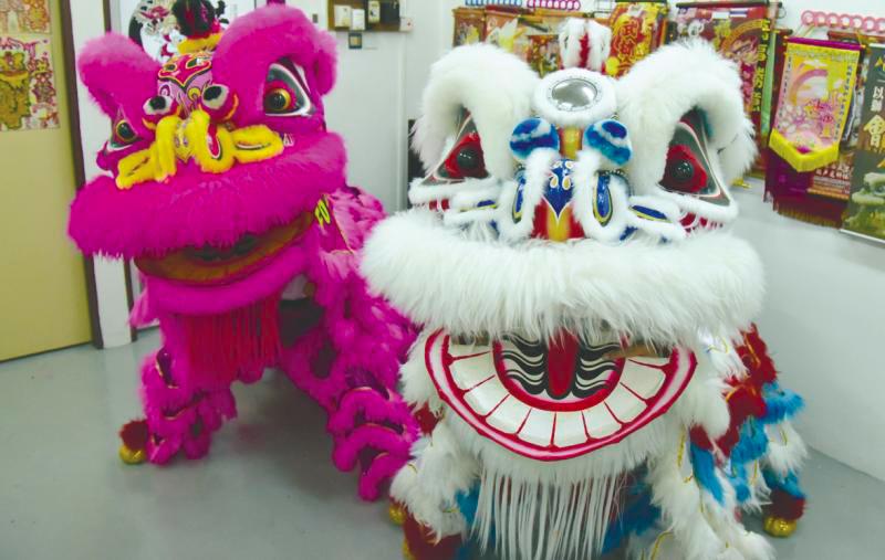 $!Hong Yi uses a variety of lion heads in their performances, ranging from the standard versions (right) to those decorated with LED lights (far right), and a rare dragon-shaped head (bottom, left). – SYAZWAN KAMAL/THESUN