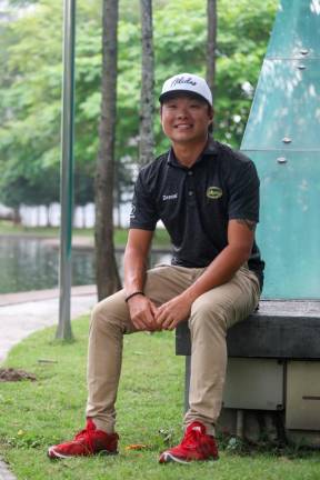 San aims to follow the footsteps of his professional golf idol, Tiger Woods. - Picture courtesy by Asyraf Rasid/theSun