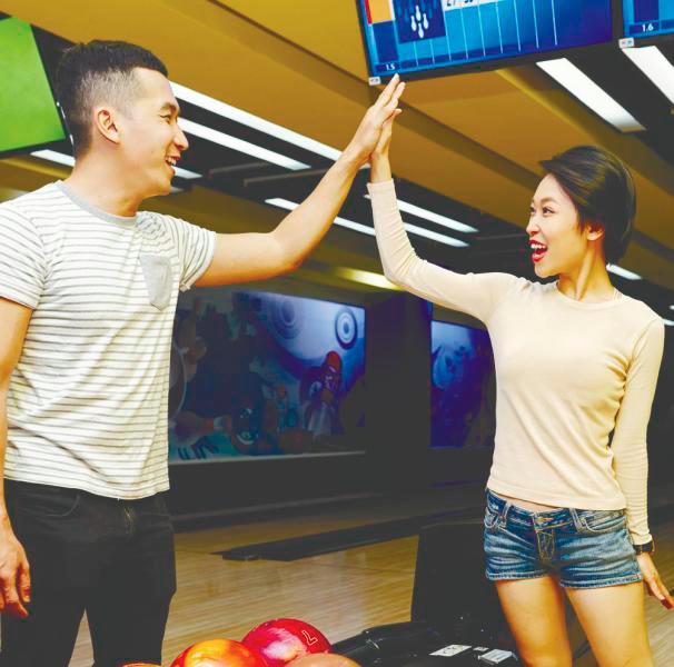 Bowling is considered the perfect icebreaker between two individuals. – 123RF $!Bowling is considered the perfect icebreaker between two individuals. – 123RF