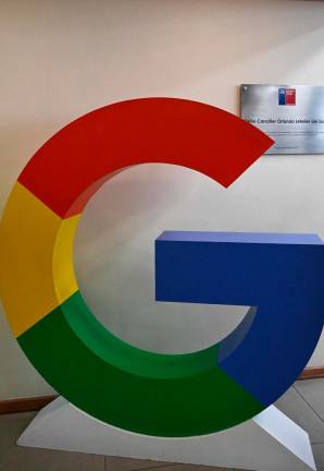 A Google logo is pictured during the signing of the agreement for the implementation of the first submarine fiber optic cable between South America and Asia-Pacific in Santiago on June 4, 2025. Chile and Google signed on Wednesday an agreement for the installation of the first submarine fiber optic cable that will connect South America with Oceania and Asia, an alternative to existing routes that will provide higher connection speeds. - RODRIGO ARANGUA / AFP)