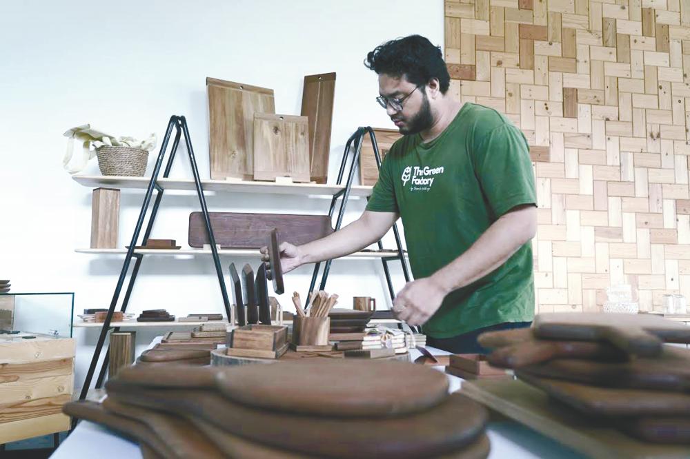 $!Every chip of wood is put to good use in Harith’s workshop. – AMIRUL SYAFIQ/THESUN