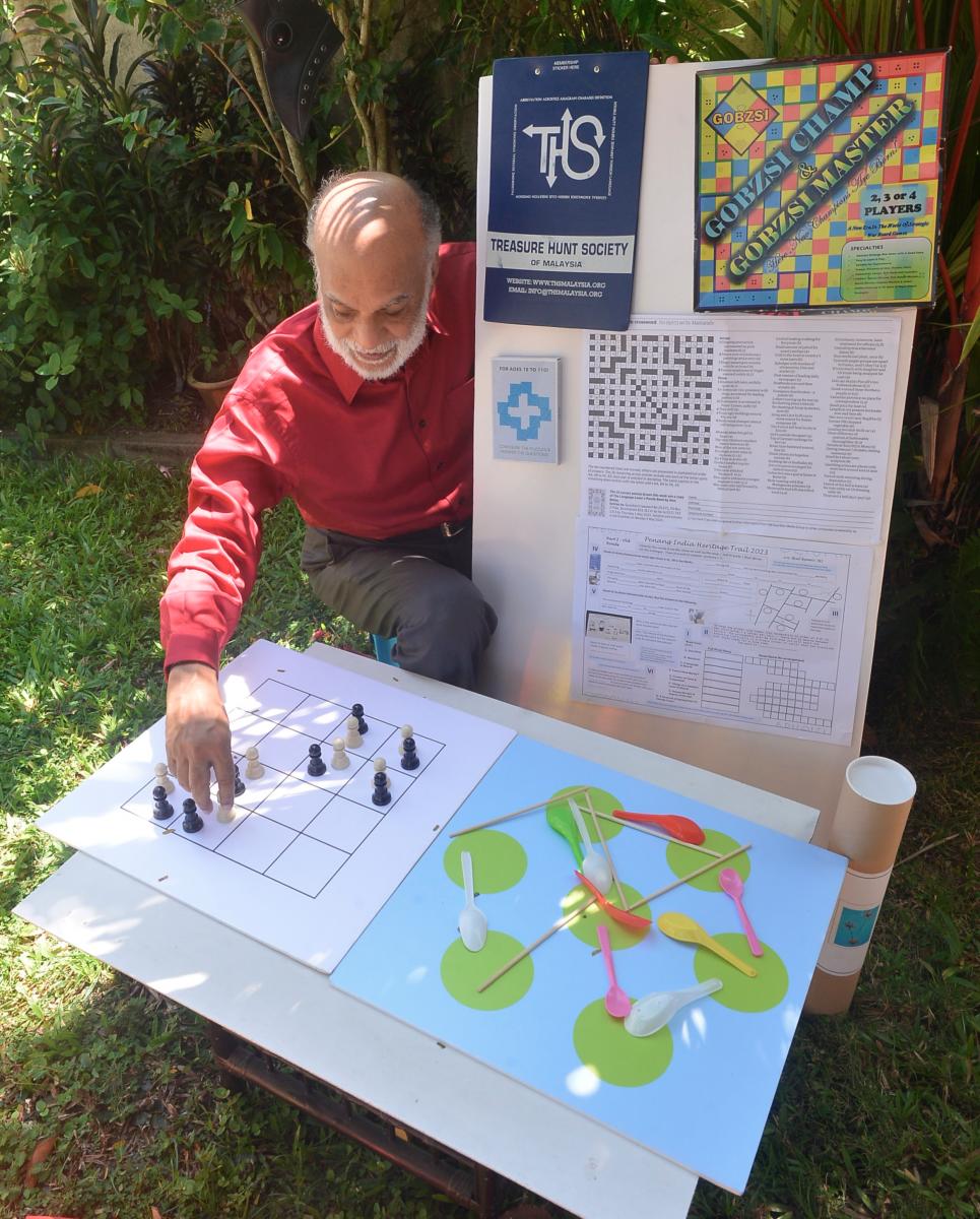 Several of his custom-designed puzzle boards. $!Several of his custom-designed puzzle boards.