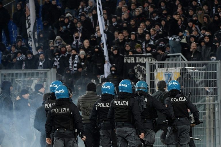 Eintracht Frankfurt’s fans clashed with police during their side’s 3-1 Europa League win at Lazio. — AFP