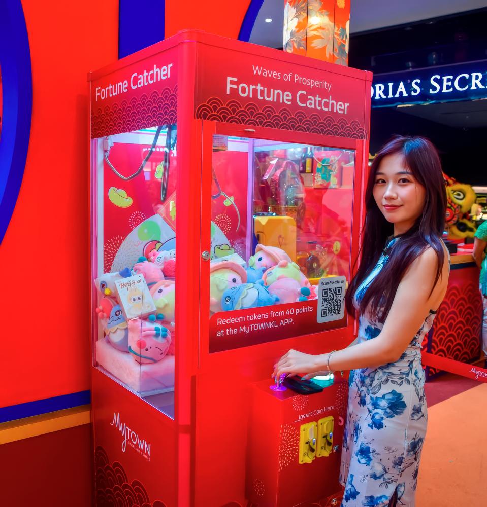 $!Shoppers can win a Tadaland plushie through the Fortune Catcher machine.