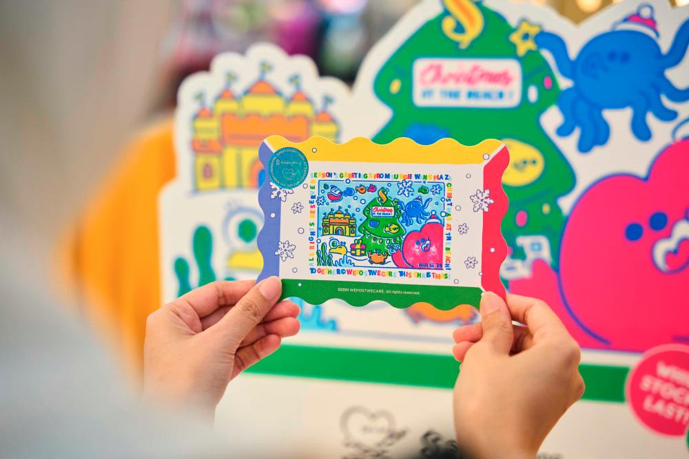 $!Shoppers can redeem a DIY Christmas postcard with a minimum spending of RM80.