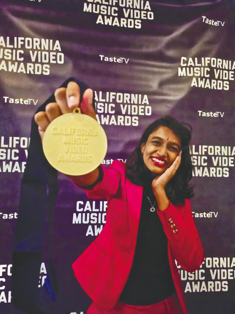 Heerraa after winning the award at 6th Annual California Music Video Awards. – COURTESY OF HEERRAA