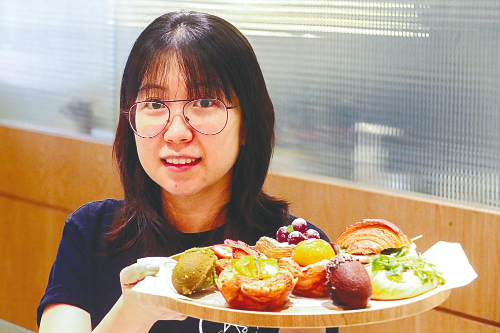 Xiaoly Koh with her pastries.